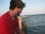 sitting on the dock of the sea